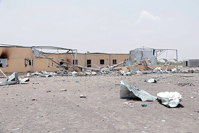ADEN: Photo shows the damage at the Al-Anad airbase, some 60 kilometers north of Yemen’s second city Aden, after it was reportedly targeted by Houthi rebels. —AFP