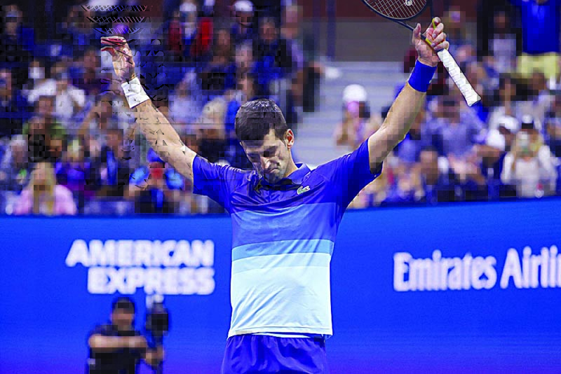 NEW YORK: Serbia's Novak Djokovic celebrates after winning his 2021 US Open Tennis tournament men's semifinal match against Germany's Alexander Zverev at the USTA Billie Jean King National Tennis Center in New York, on Friday. - AFP