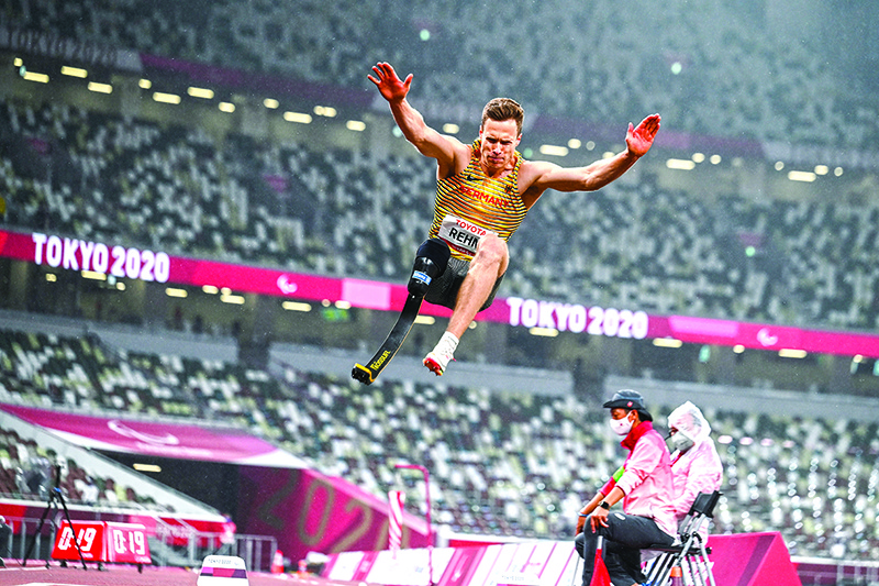 TOKYO: Germany’s Markus Rehm competes in the men’s long jump T64 final during the Tokyo 2020 Paralympic Games at the Olympic Stadium in Tokyo yesterday. — AFP