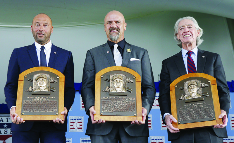 COOPERSTOWN, New York: Derek Jeter, Larry Walker and Ted Simmons pose with their plaques during the Baseball Hall of Fame induction ceremony at Clark Sports Center on Wednesday. - AFP n