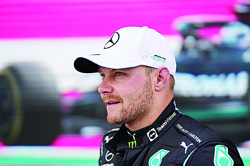 SPIELBERG: In this file photo taken on June 27, 2021 Third placed Mercedes' Finnish driver Valtteri Bottas looks on after the Formula One Styrian Grand Prix at the Red Bull Ring race track in Spielberg, Austria. - AFPn