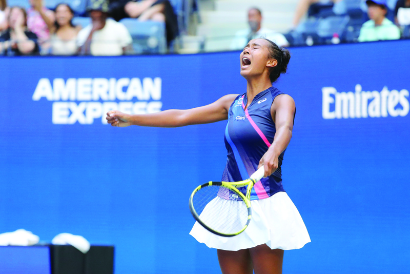 NEW YORK: Canada's Leylah Fernandez reacts after winning her 2021 US Open Tennis tournament women's quarter-finals match against Ukraine's Elina Svitolina at the USTA Billie Jean King National Tennis Center in New York, on Tuesday. - AFPn