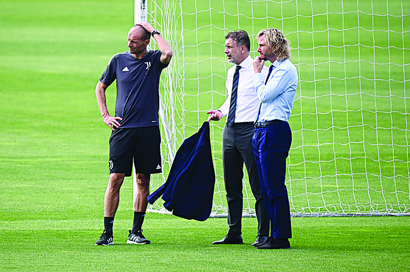 TURIN: Juventus' Italian coach Massimiliano Allegri (left), Sport Coordinator Federico Cherubini and Vice President Pavel Nedved attend a training session with teammates at The Juventus Training Centre in Turin yesterday, on the eve of the team's UEFA Champions League Group H match against Malmo. - AFPn