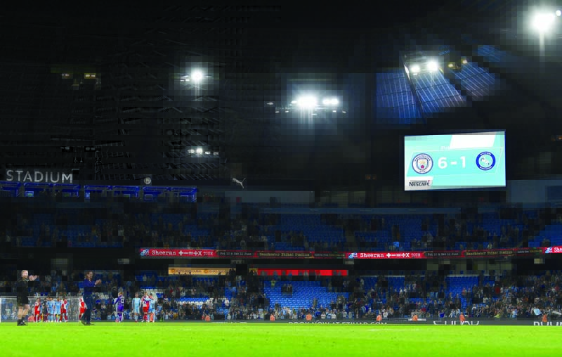 MANCHESTER: The scoreboard shows the final 6-1 score after the English League Cup third round football match between Manchester City and Wycombe Wanderers at the Etihad stadium in Manchester, northwest England on Tuesday. - AFPnn