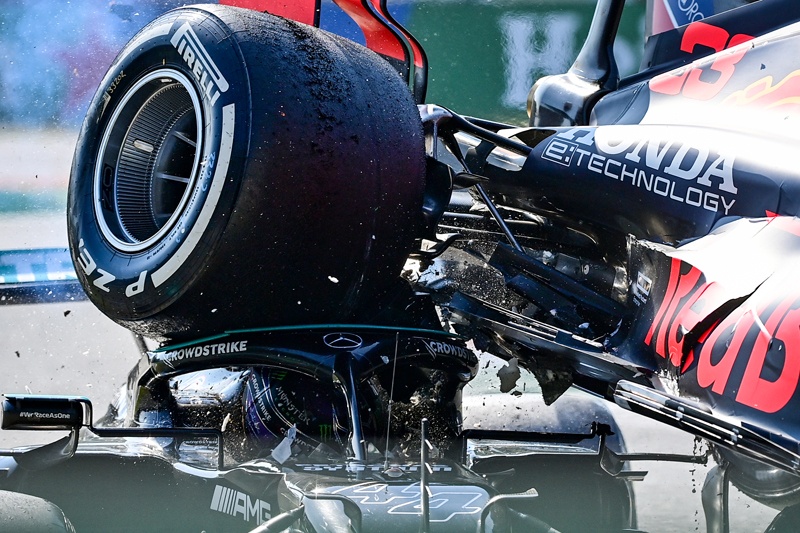 MONZA: Mercedes' British driver Lewis Hamilton (left) and Red Bull's Dutch driver Max Verstappen collide during the Italian Formula One Grand Prix at the Autodromo Nazionale circuit in Monza, on Sunday. - AFPnn