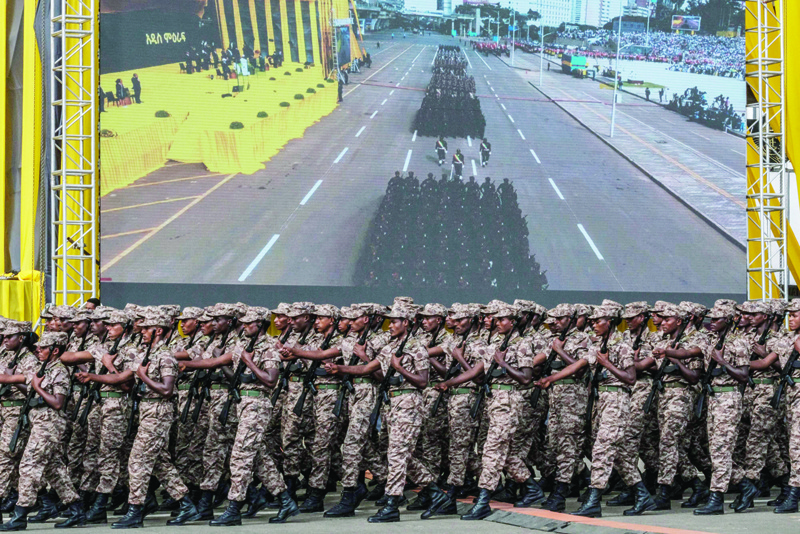 ADDIS ABABA: Members of the Ethiopian defense forces parade in front of a screen in the city of Addis Ababa, Ethiopia. - AFP n