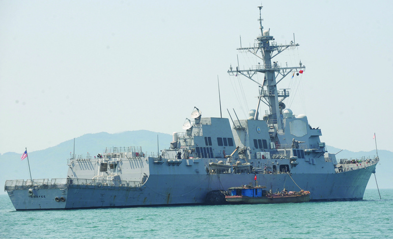 DANANG: The guided missile destroyer USS Chafee is seen anchored as a group of Vietnamese navy's officers attend a disaster control training with US sailors at Tien Sa port in the central city of Danang. A Russian and US warship came close to an incident on October 15, 2021 in the Sea of Japan. - AFP n