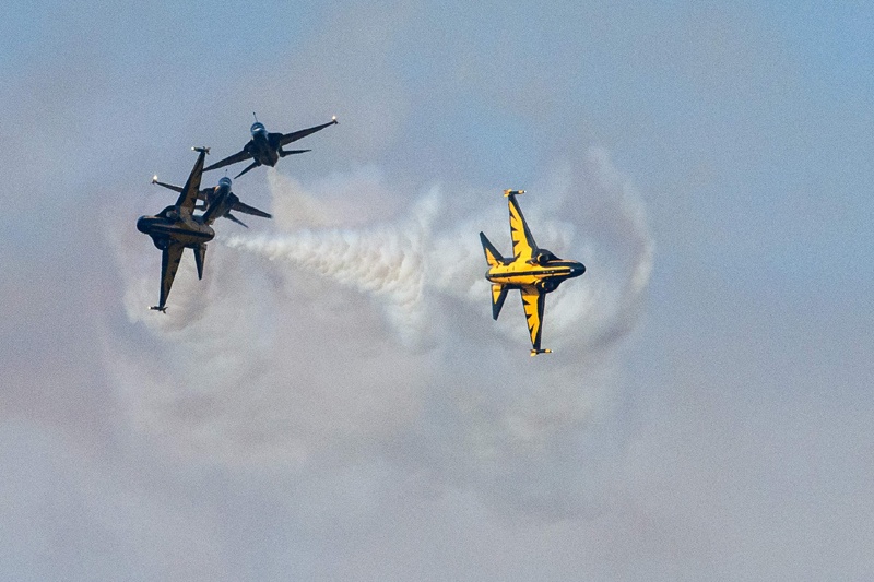 SEONGNAM: South Korea's Air Force T-50 jets of the 'Black Eagles' 53rd Air Demonstration Group perform at the Seoul International Aerospace and Defense Exhibition (ADEX) in Seongnam, south of Seoul, on October 18, 2021. - AFP n