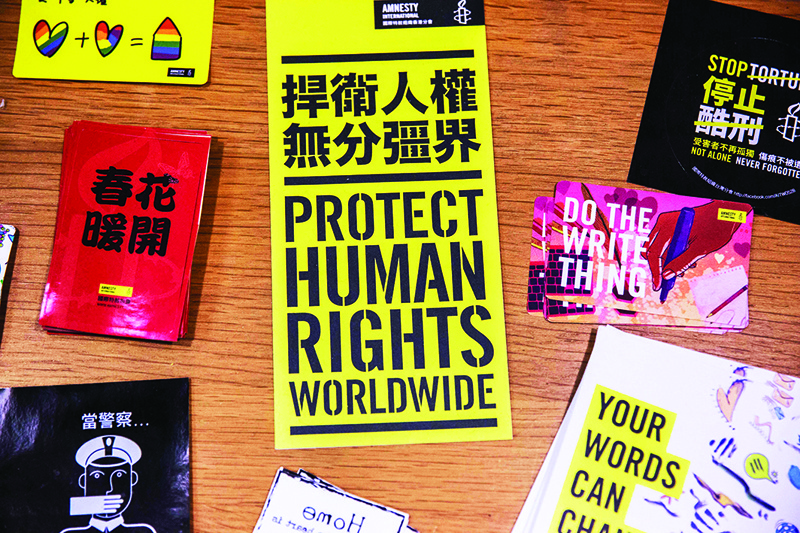 HONG KONG: Amnesty International marketing leaflets are seen in their office in Hong Kong, as the Human Rights organization announces it will be closing its offices by the end of 2021 citing Beijing’s enacted national security law as a reason. – AFP n