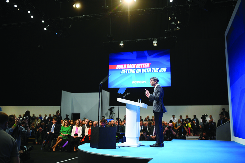 MANCHESTER, UK: Britain's Chancellor of the Exchequer Rishi Sunak speaks on the second day of the annual Conservative Party Conference being held at the Manchester Central convention centre in Manchester, northwest England, yesterday.-AFPnn