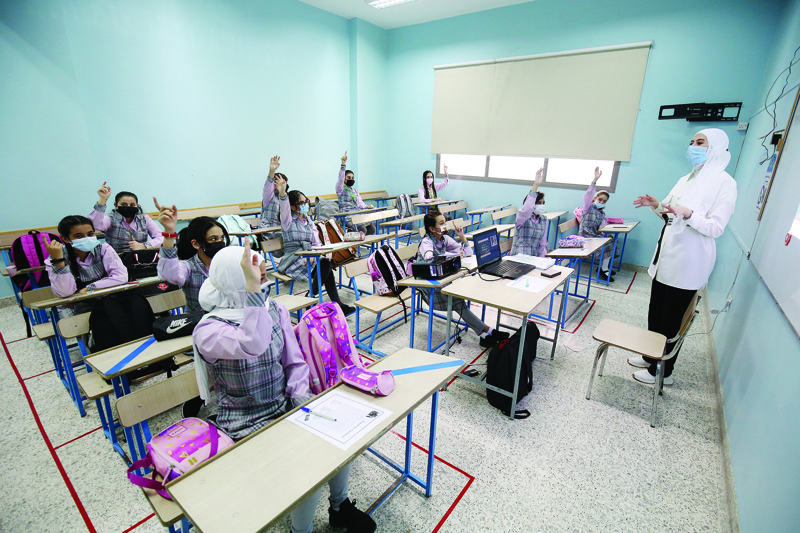 KUWAIT: Students attend class at a school in Salmiya after public schools reopened for on-campus learning yesterday for the first time after 19 months due to the COVID-19 pandemic. - Photo by Yasser Al-Zayyatn