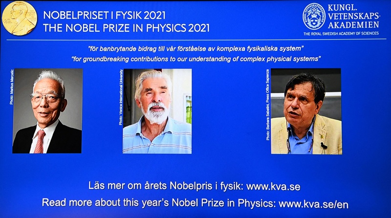 STOCKHOLM: Portraits of the co-winners of the 2021 Nobel Prize in Physics (from left) Syukuro Manabe, Klaus Hasselmann and Giorgio Parisi are displayed on a screen at the Royal Swedish Academy of Sciences in Stockholm yesterday. - AFP n