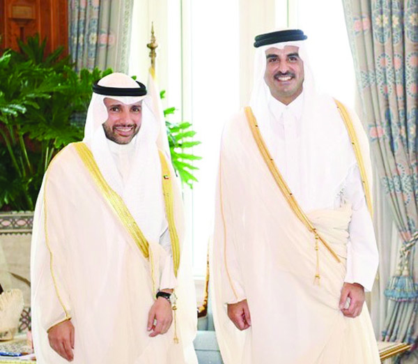 DOHA: Qatari Amir Sheikh Tamim bin Hamad Al-Thani receives Kuwait's National Assembly Speaker Marzouq Al-Ghanem yesterday. - KUNA n