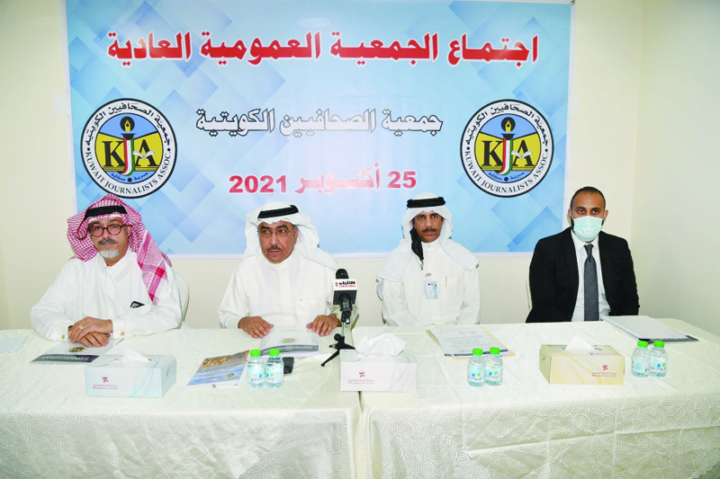 KUWAIT: Adnan Khalifa Al-Rashid (second from left) attends the Kuwait Journalists Association's general assembly meeting yesterday.n