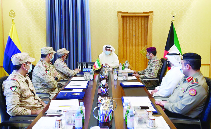 KUWAIT: Kuwait's Defense Minister Sheikh Hamad Jaber Al-Ali Al-Sabah chairs a meeting with senior defense ministry officials yesterday. - KUNAnn