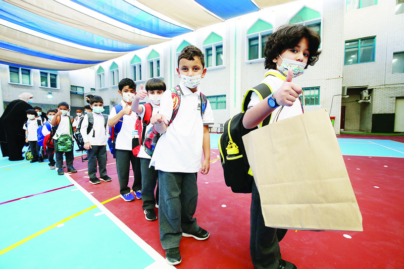 KUWAIT: This file photo taken on September 26, 2021 shows students arriving to school after in-person classes resumed in Kuwait. - Photo by Yasser Al-Zayyatn