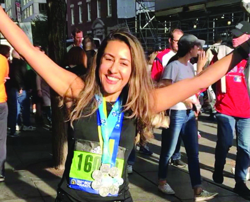Altaf Suleiman poses with her medal following her participation in the Boston Marathon.n