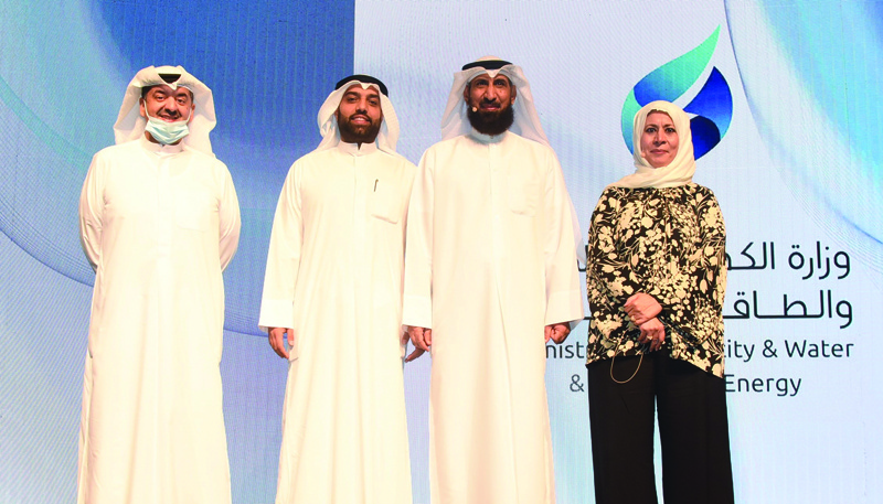 KUWAIT: (From left) Zain's Waleed Al-Khashti, Malek Al-Sabah, Minister of Electricity, Water, and Renewable Energy Dr Mishan Al-Otaibi and Zain Kuwait CEO Eaman Al-Roudhan.nn