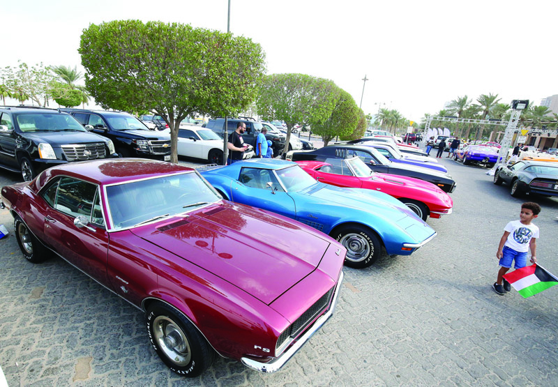 KUWAIT: Vintage vehicles on display at the Marina Crescent as part of an event hosted by the Q8 Old Cars Team. - Photos by Yasser Al-Zayyatn