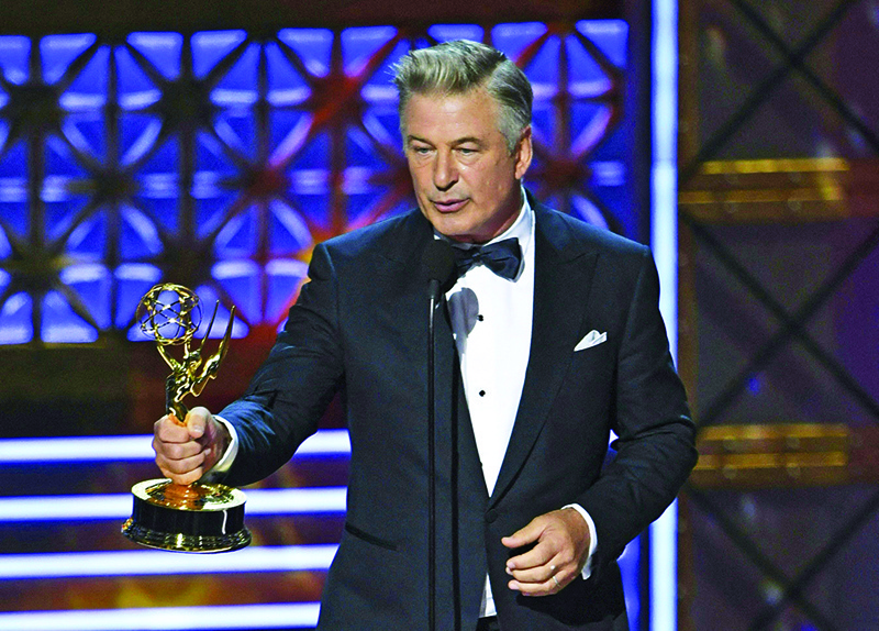 In this file photo, Alec Baldwin accepts the award for Outstanding Supporting Actor in a Comedy Series for ‘Saturday Night Live’ onstage during the 69th Emmy Awards in Los Angeles. n