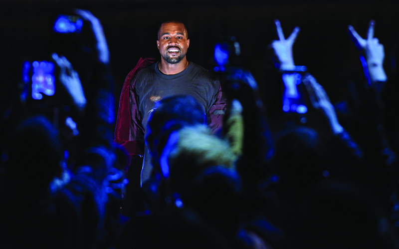 In this file photo Kim Kardashian’s husband rapper Kanye West performs during his concert in central Yerevan.—AFP n