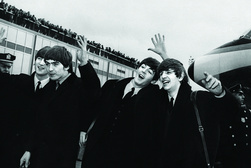 This file photo taken on February 7, 1964 shows English band the Beatles with (from left) John Lennon, Ringo Starr, Paul McCartney and George Harrison arriving at John F Kennedy Airport in New York.-AFP photosn