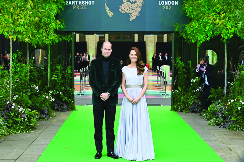Britain’s Prince William, Duke of Cambridge, (left) and Britain’s Catherine, Duchess of Cambridge, (right) arrive on the green carpet to attend the inaugural Earthshot Prize awards ceremony at Alexandra Palace in London.—AFP n