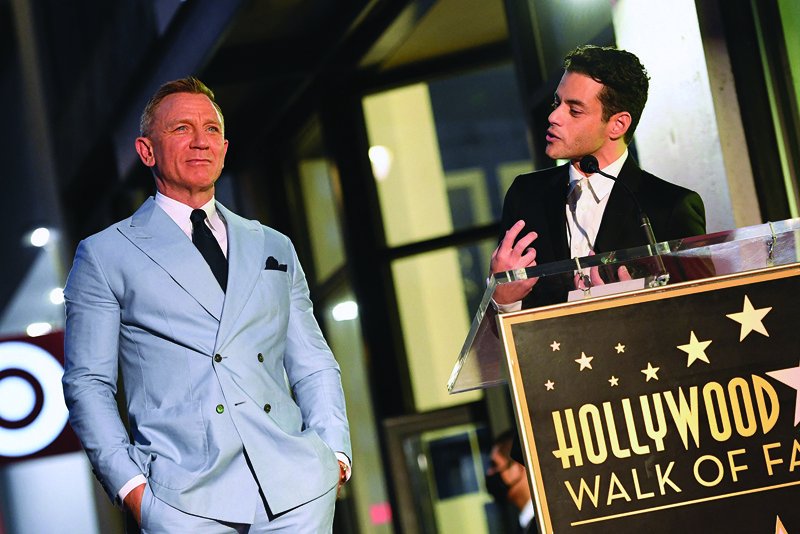 US actor Rami Malek (right) speaks during the ceremony to honor British actor Daniel Craig with a star on the Hollywood Walk of Fame in Los Angeles, California.—AFP n