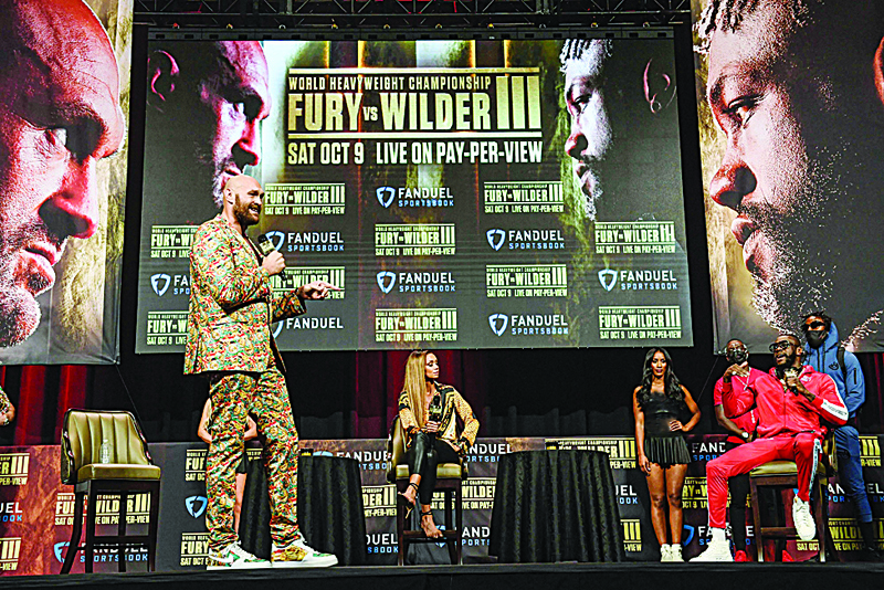 LAS VEGAS: British boxer Tyson Fury (left) and challenger US boxer Deontay Wilder attend a press conference for their WBC heavyweight championship fight on Wednesday at the MGM Grand Garden Arena ahead of their Oct 9, 2021 fight. - AFP n