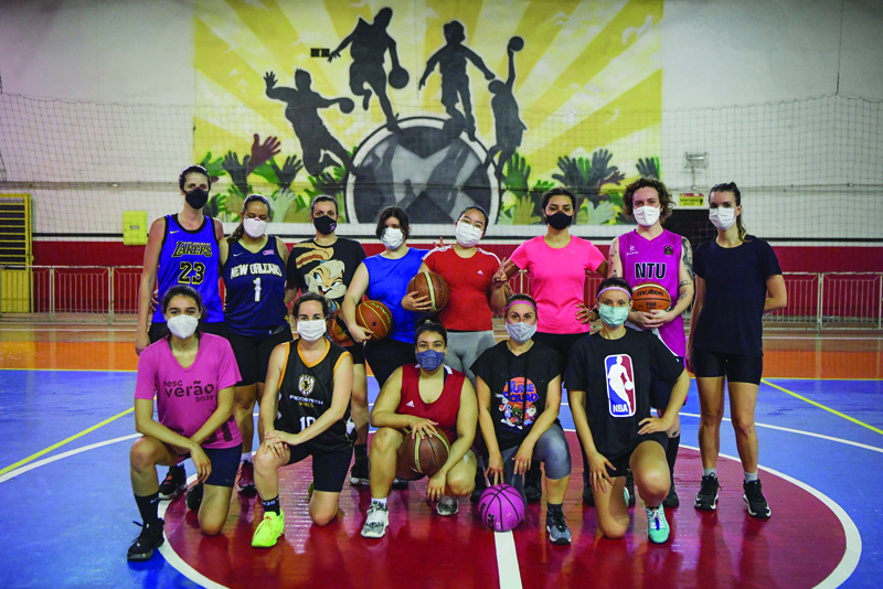SAO PAULO: Fulaninhas amateur basketball team players pose for a photo during a training session, in Sao Paulo, Brazil, on October 6, 2021. - AFPn