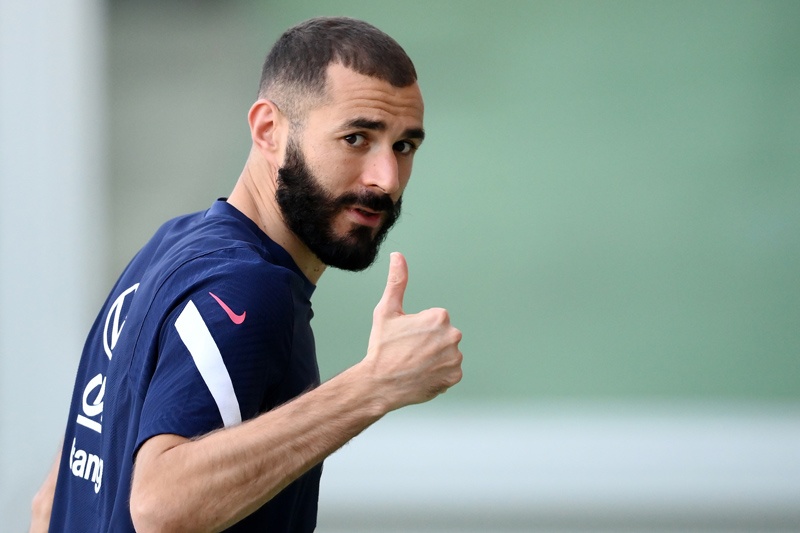 TURIN: France's forward Karim Benzema reacts after a training session at the Olympic stadium in Turin, on Friday two days prior to the UEFA Nations League final football match between Spain and France. - AFPnn