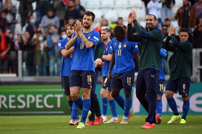 TURIN: Giorgio Chiellini (right) celebrates with teammates at the end of the UEFA Nations League third place football match between Italy and Belgium, at the Juventus Stadium, in Turin, yesterday. – AFPn