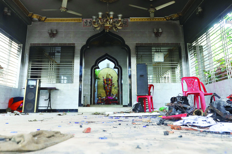 COMILLA: A vandalize temple is seen in Comilla yesterday, after hundreds vandalized several Hindu temples across the Muslim-majority country. - AFP n