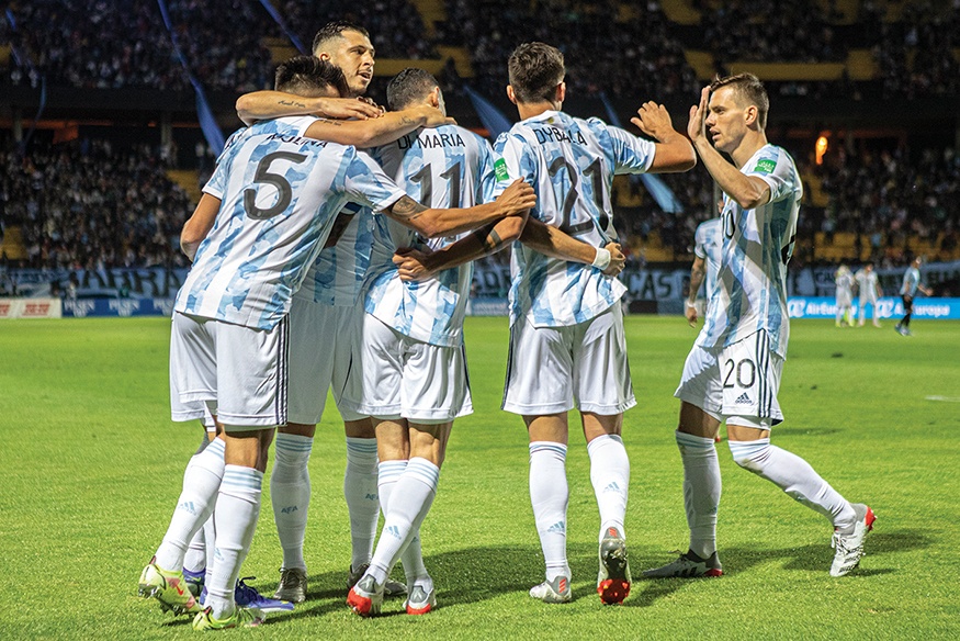 MONTEVIDEO: Argentina’s Angel Di Maria (11) celebrates with teammates after scoring against Uruguay during their South American qualification football match for the FIFA World Cup Qatar 2022, at the Campeon del Siglo stadium in Montevideo on Friday. — AFP