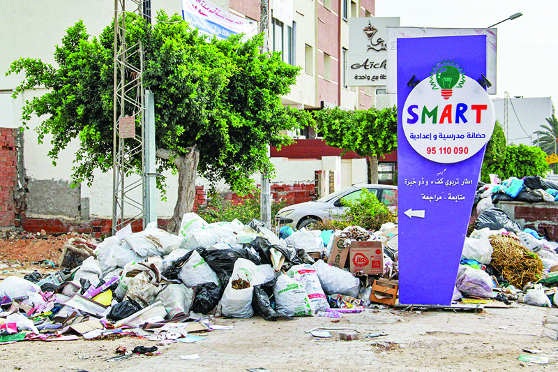 SFAX, Tunisia: Photo shows a view of sacks and boxes of garbage piling up along the side of a street in the centre of the coastal city of Sfax, about 270 kilometers southeast of Tunisia's capital. – AFP n