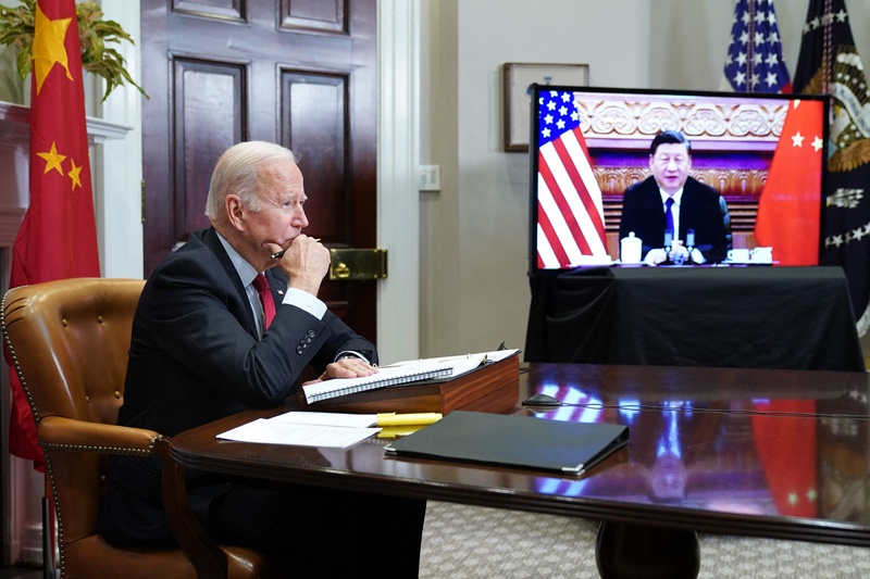 WASHINGTON: US President Joe Biden meets with China's President Xi Jinping during a virtual summit from the Roosevelt Room of the White House in Washington, DC. - AFP n