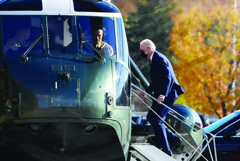 MARYLAND: US President Joe Biden boards a helicopter after getting a medical check up at Walter Reed Medical Center in Bethesda, Maryland. - AFP n