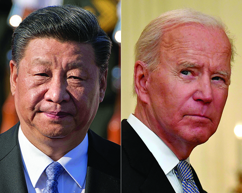 WASHINGTON: This combination of file pictures shows Chinese President Xi Jinping (left) and US President Joe Biden. US President Joe Biden will hold a hotly anticipated virtual summit with his Chinese counterpart Xi Jinping today, the White House announced, as tensions mount over Taiwan, human rights and trade. – AFP n