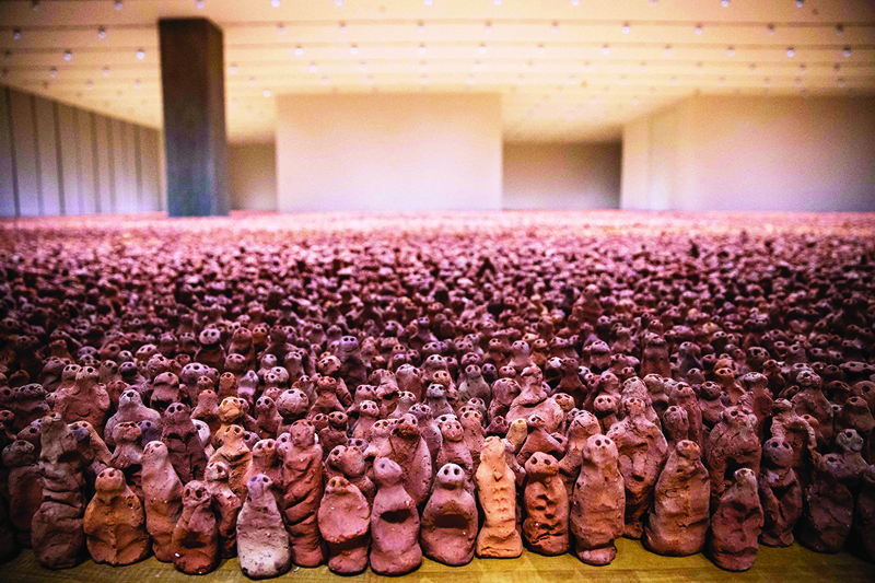 Asian Fields by Anthony Gormley is seen during a press tour of the new M+ Museum in Hong Kong.—AFP photosn