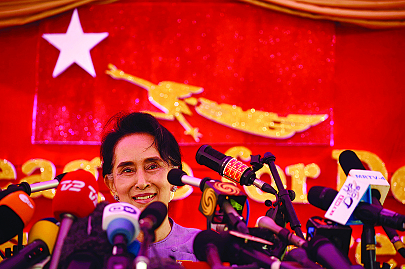 YANGON: In this file photo taken on November 5, 2015, Myanmar opposition leader Aung San Suu Kyi and head of the National League for Democracy (NLD) speaks at a press conference from her residential compound in Yangon. - AFPn