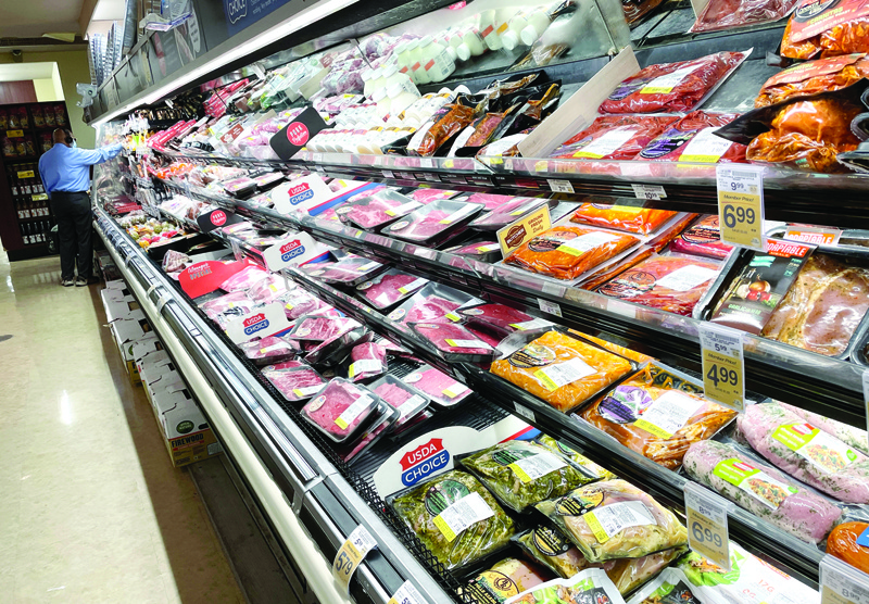 SAN FRANCISCO, US: In this file photo, a customer shops for meat at a Safeway store in San Francisco, California. - AFPnn