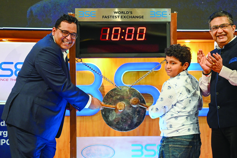 MUMBAI: Paytm, an Indian cellphone-based digital payment platform, founder Vijay Shekhar Sharma (left) rings a ceremonial gong during his company's IPO listing ceremony at the Bombay Stock Exchange (BSE) in Mumbai yesterday. - AFP n