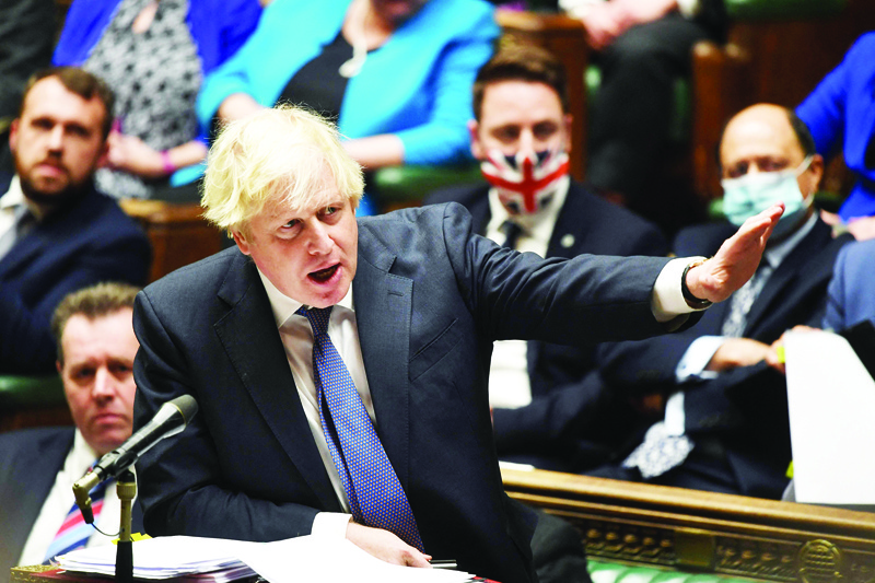 LONDON: A handout photograph released by the UK Parliament shows Britain's Prime Minister Boris Johnson speaking during Prime Minister's Questions (PMQs) in the House of Commons in London. - AFPnn