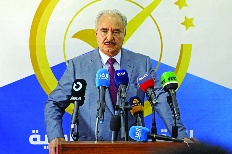 BENGHAZI: Libya's eastern military chief Khalifa Haftar gives a press conference in this eastern city yesterday. - AFP n