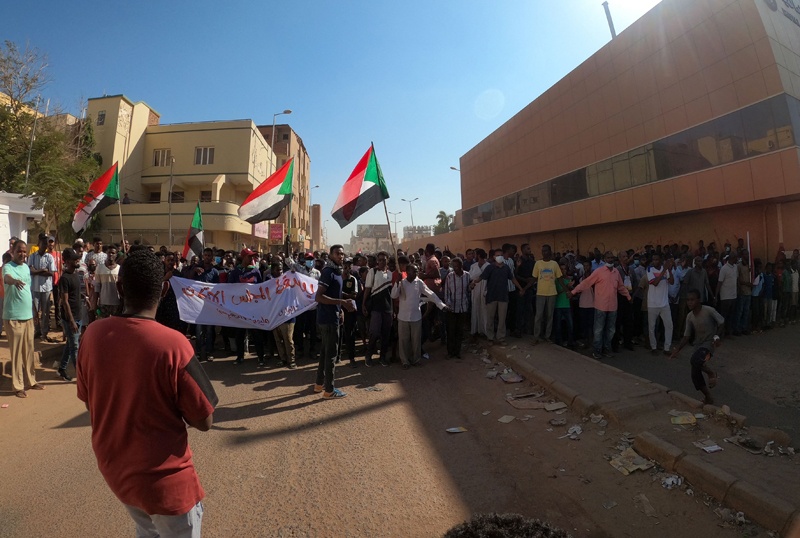 KHARTOUM: Sudanese opponents of the military coup take to the streets of the capital yesterday in the bloodiest day since the military's Oct 25 takeover. – AFP n