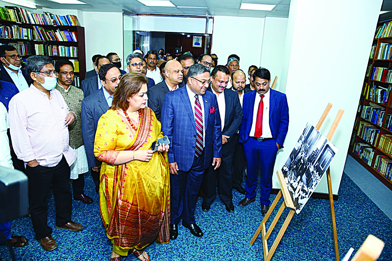 KUWAIT: Indian Ambassador Sibi George, Joice Sibi and others take a look at a portrait on display at the exhibition on 'Making of Constitution of India' at the Indian embassy.n