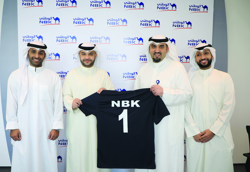 KUWAIT: NBK and Sadan Soccer Academy officials at the signing ceremony.n