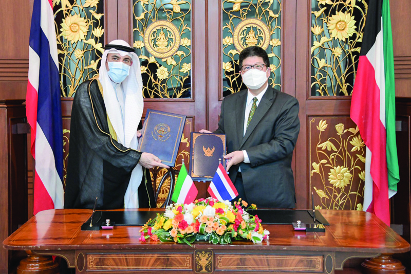 BANGKOK: Thani Thongphakdi, Permanent Secretary for Foreign Affairs of the Kingdom of Thailand, and Mohammad Husain Al-Failakawi, Ambassador of the State of Kuwait to Thailand, are seen after signing the agreement.nn