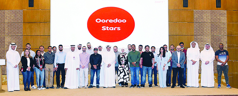 KUWAIT: Abdulaziz Yaqoub Al-Babtain, CEO of Ooredoo Kuwait, in a group photo with distinguished staff.n