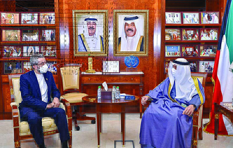 KUWAIT: Kuwaiti Foreign Minister Sheikh Ahmad Nasser al-Mohammad Al-Sabah (right) meets Iranian Deputy Foreign Minister Ali Bagheri in Kuwait City on Thursday. - KUNA photosn
